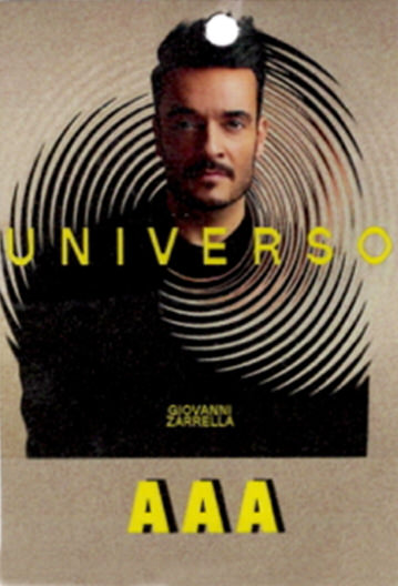 Portrait of a man with dark hair and beard in front of a spiral pattern with the word 'UNIVERSO' and the name 'Giovanni Zarrella' above 'AAA' in yellow text.